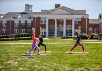Yoga being done on the campus lawn