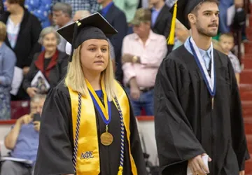 Students wearing cap and gown