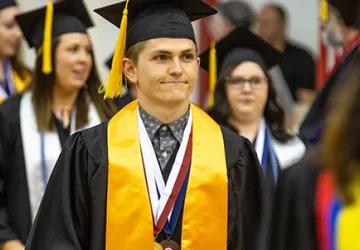 Students wearing cap and gown