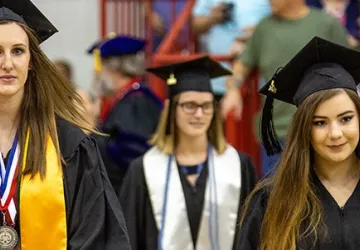 Students wearing cap and gown