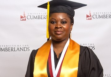Image of a graduate in cap and gown
