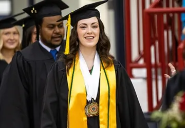 Students wearing cap and gown