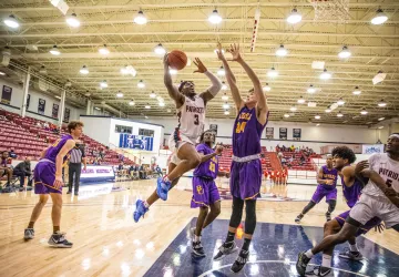 Basketball player dunking