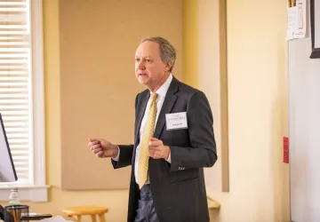 A person giving a lecture