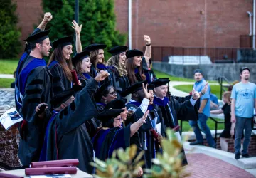 Students wearing cap and gown