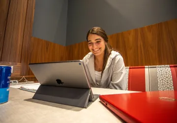 A student studying on a tablet