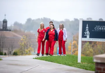 Nursing students walking on campus