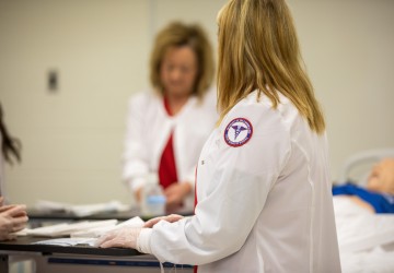 Nurses standing in the backround