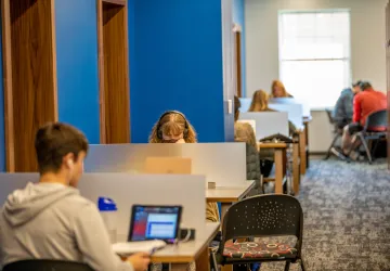 Several students studying in a room