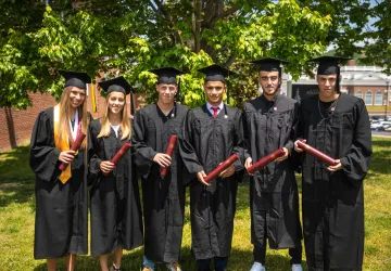 Several students wearing cap and gown