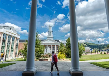 Students walk to class near the Grace Crum Rollins Center