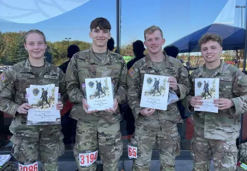 ROTC cadets celebrate completion of a Ruck March 