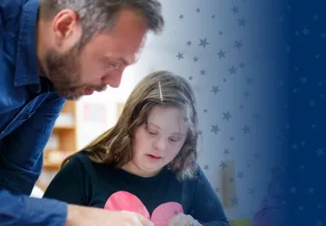 Special Education Teacher Working with Student