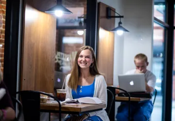 A student studies inside Cumberlands coffee shop. 