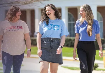 Three female students walk from BCC to Gatliff. 