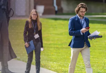 Students leave the business forum annual event. 