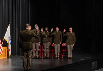 ROTC cadets in the class of 2024 take the Oath of Office commissioning them as 2nd lieutenants in the U.S. Army.