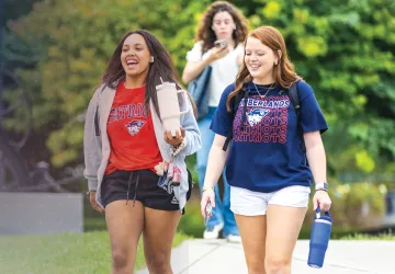 Students walk to class on campus. 
