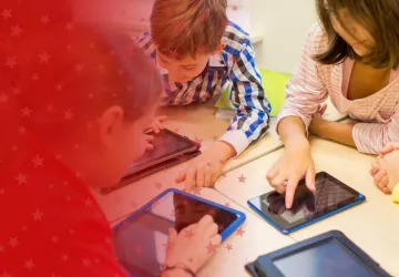 Teacher and Students Working with Digital Technology