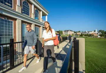 Students walk across the viaduct on the first day of classes. 