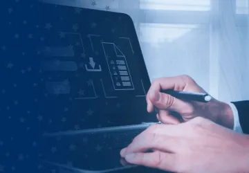 Information Security Specialist Working on Laptop