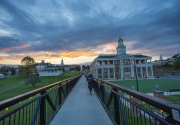 A student walks across the viaduct on the Cumberlands campus.
