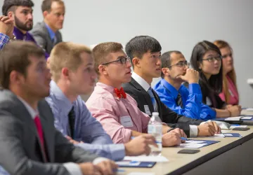 Business students listen to an important lecture. 