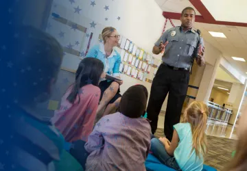 Court Officer Speaking in Classroom