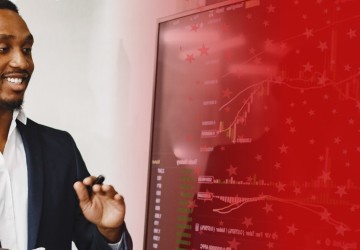 Man Working with AI on Computer Screen