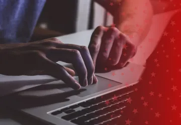 Cybersecurity Personnel on Laptop