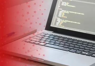 Laptop with HTML on Screen
