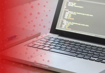 Laptop with HTML on Screen