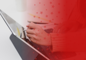 Person Writing on Tablet with Stylus