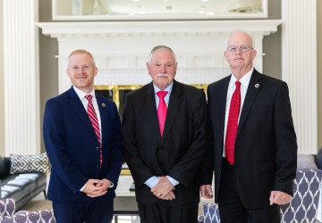 Cumberlands president Quentin Young, trustee Chair Scott Thompson and president-emeritus Dr. Larry L. Cockrum. 