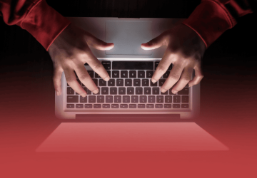 Laptop with Hands Typing