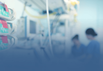 Medical Equipment with Nurses in Background