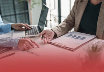 Human Service Worker with Laptop and Charts