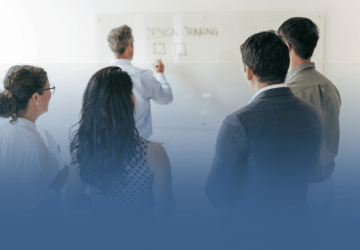 Business Professionals Taking Notes in Meeting