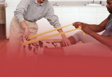 Physical Therapist Working with Patient