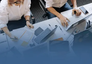 Office Workers Going Through Data