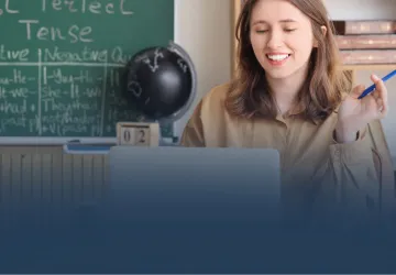 Teacher Working on Laptop