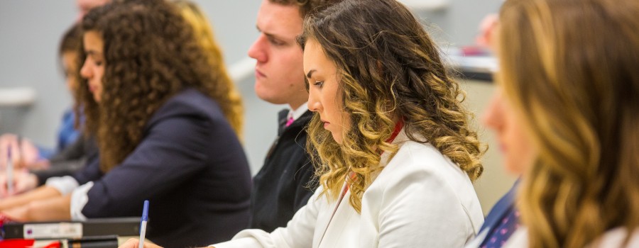 Students taking notes