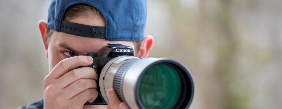 man holding camera