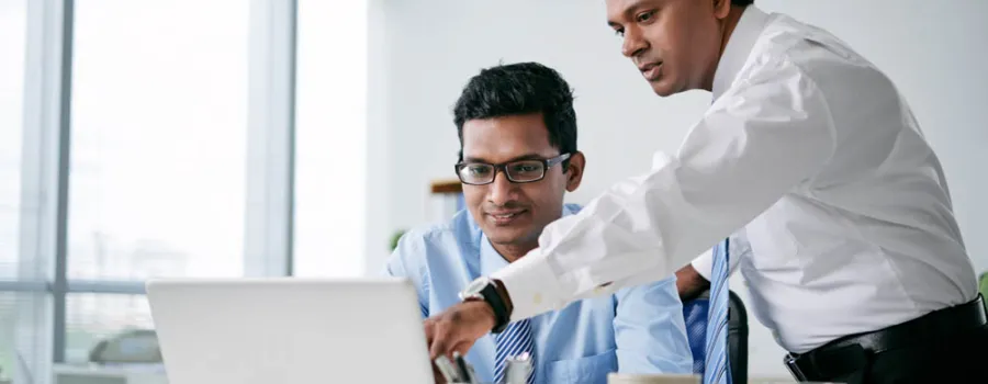 two businessmen working on a problem