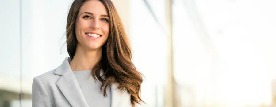 businesswoman standing outside company