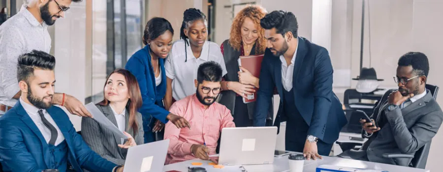 Business people working through a solution together