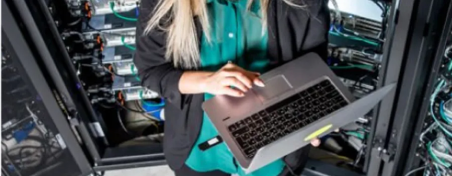 FPO graduate student with laptop