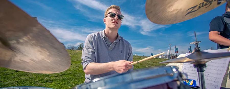 Jazz musician playing drum set