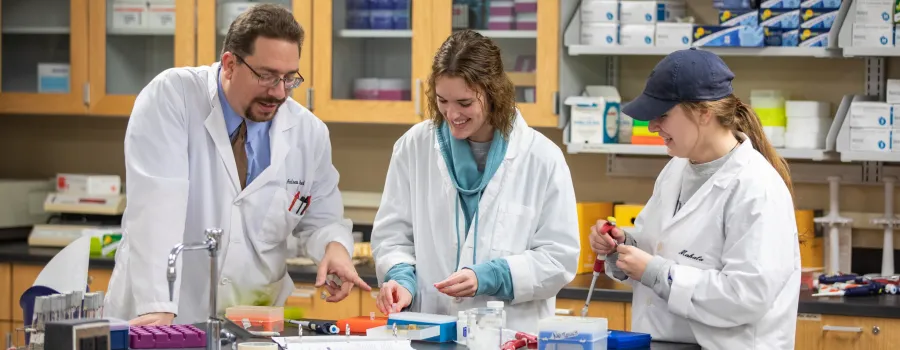 Three biologists working