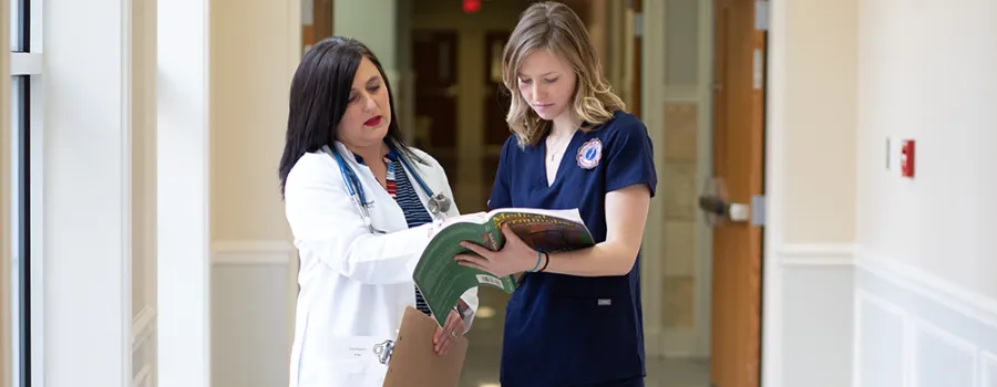 Two medical professionals in conversation.